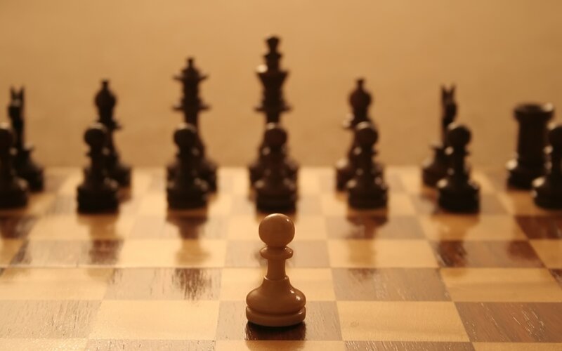 Chess Pawn on Board — Brown, Calm