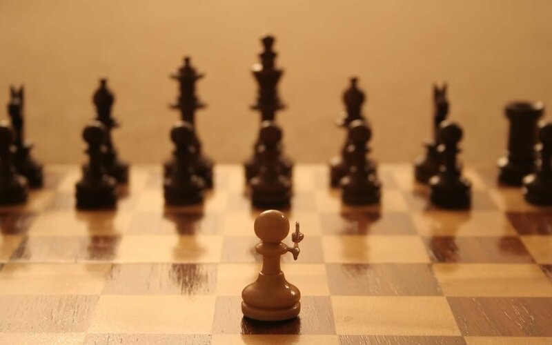 chess pawn with middle finger