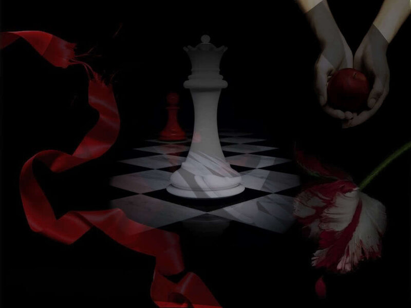 Chess piece with apple and ribbon