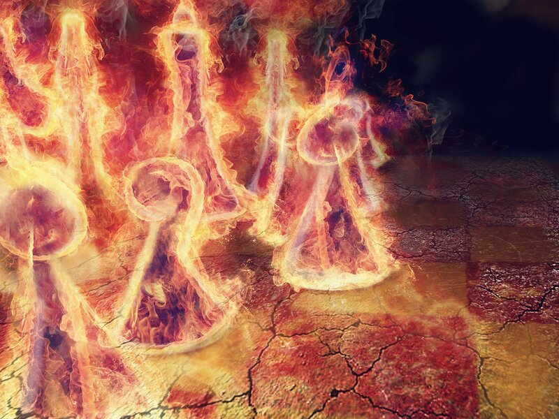 Chess pieces in flames