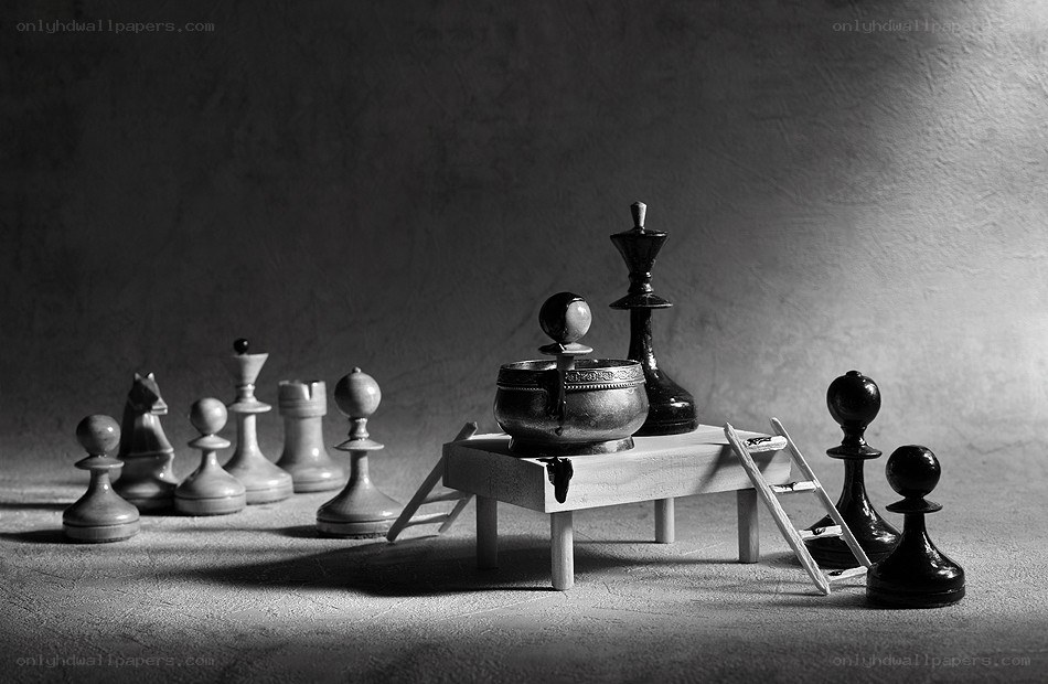 Chess pieces on a miniature table