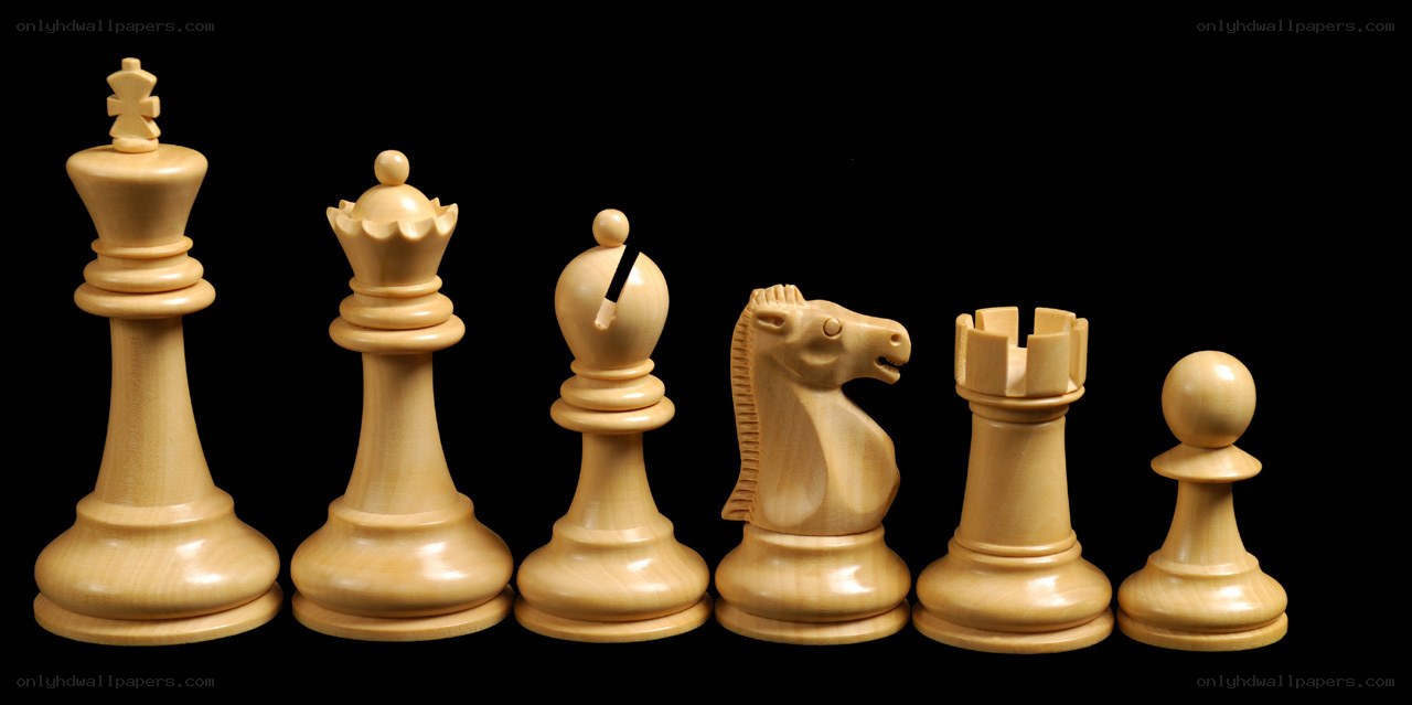 chess pieces on black background