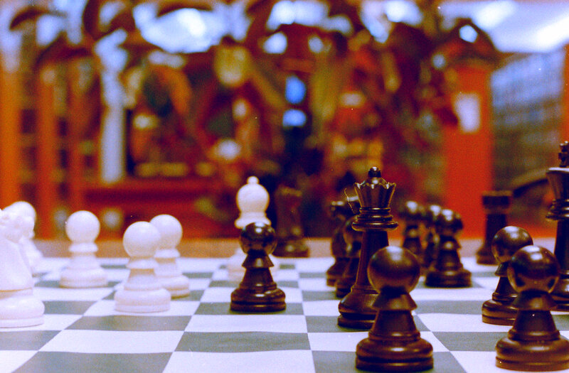 Chess Pieces on Board — Black, Calm, Photograph
