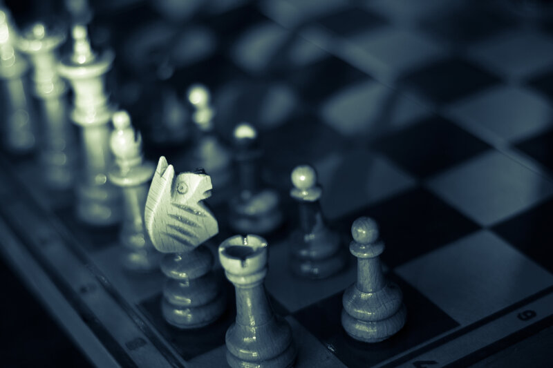 Chess Pieces on Board — Blue, Dramatic