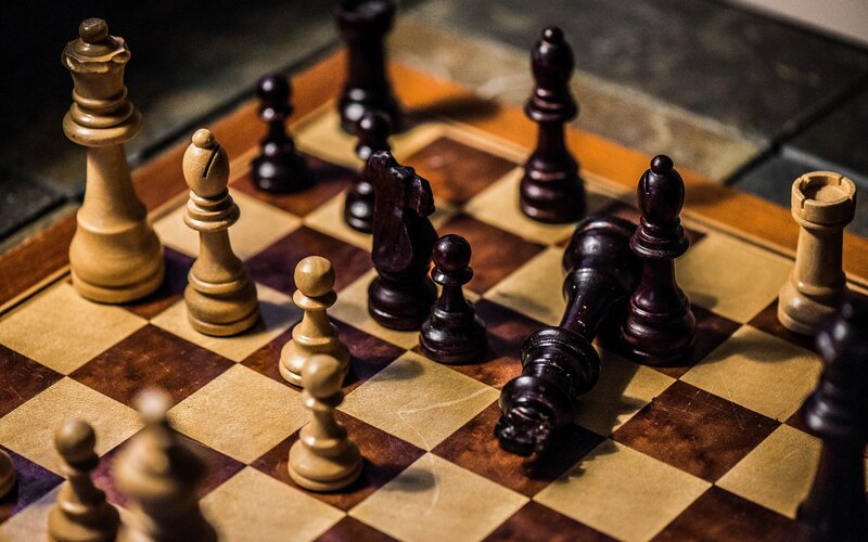 Chess Pieces on Board — Brown, Dramatic, Photograph, Chessboard, Lighting