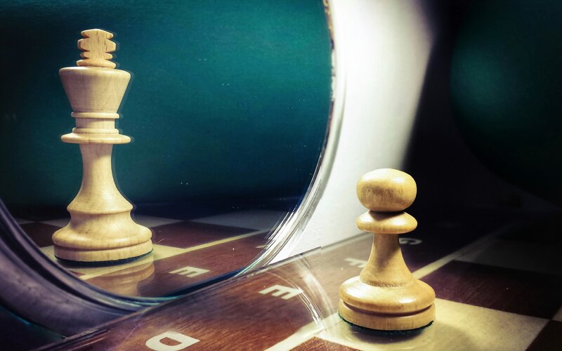 Chess Pieces on Board — Brown, Dramatic, Photograph