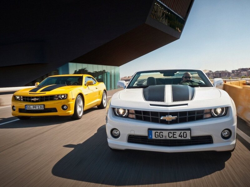 Chevrolet Camaro cars on road