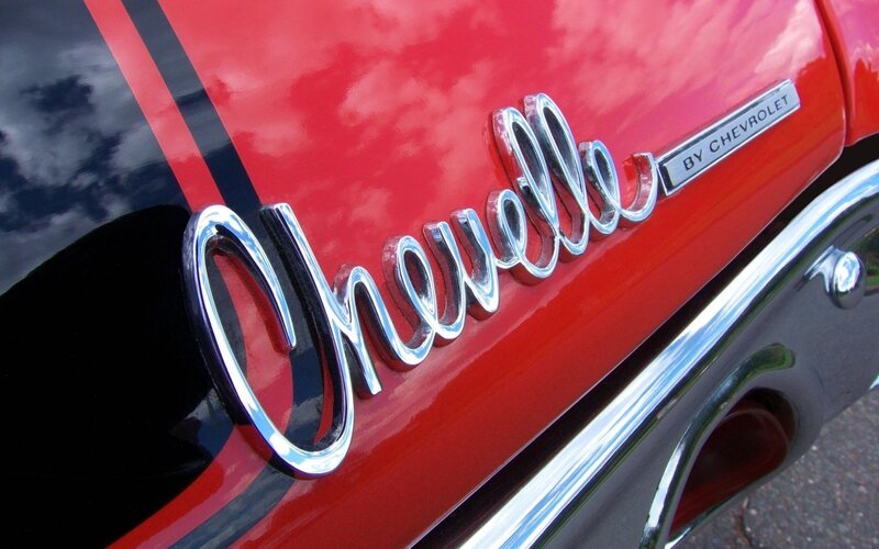 Chevrolet emblem on red car