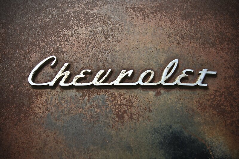 Chevrolet emblem on rusted metal