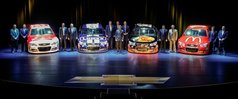 Chevrolet race cars on stage