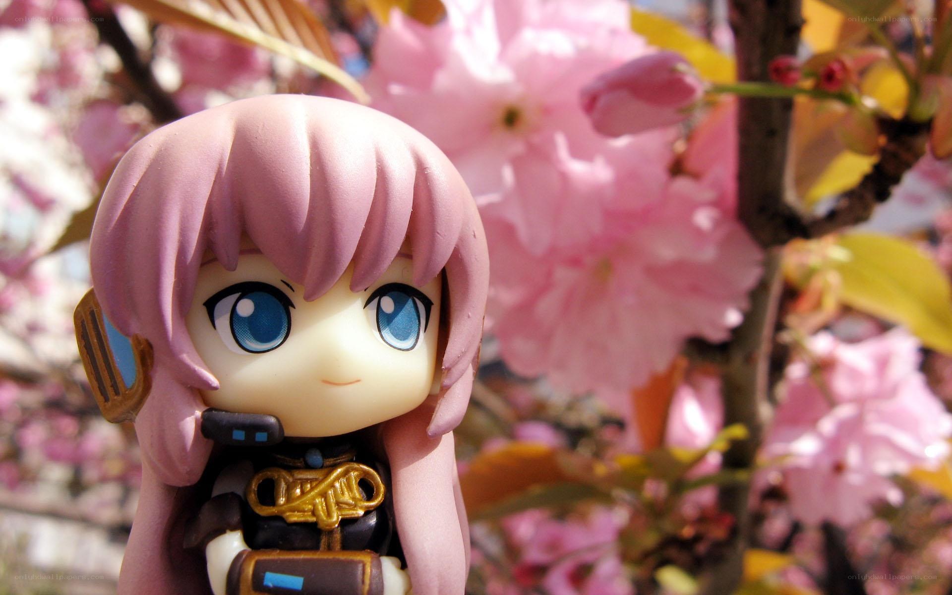 chibi figure in cherry blossoms