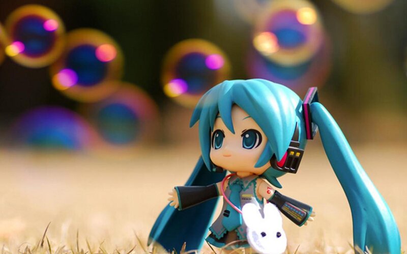 Chibi Figure in Grass — Blue