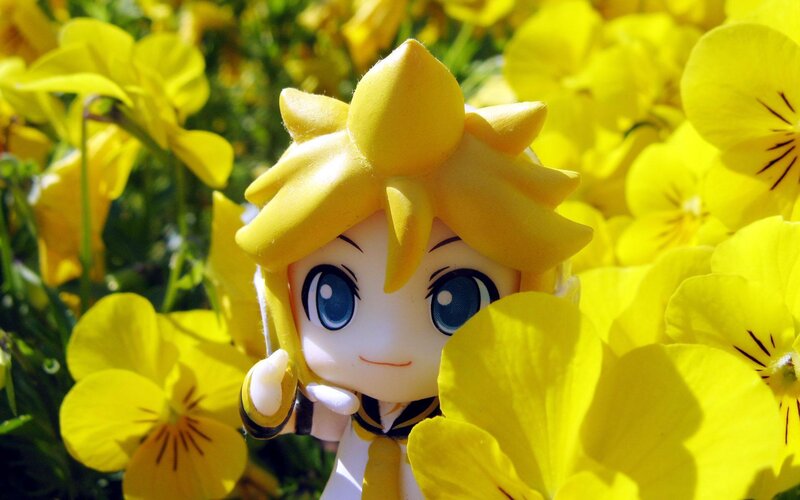 Chibi figure in yellow flowers