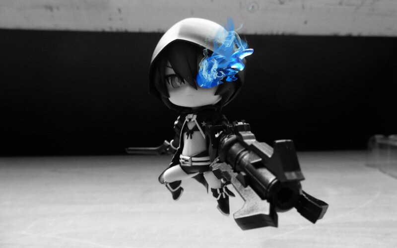 chibi figure with blue flame