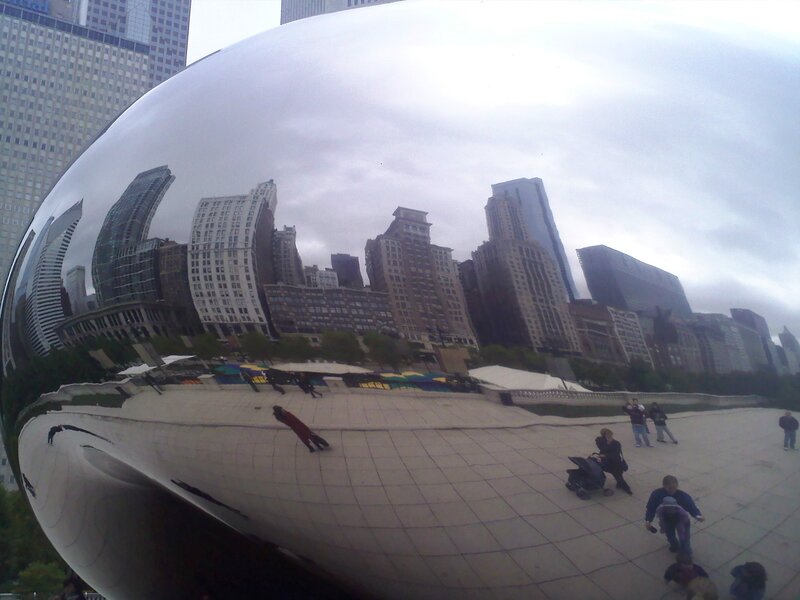 Chicago bean sculpture with city skyline