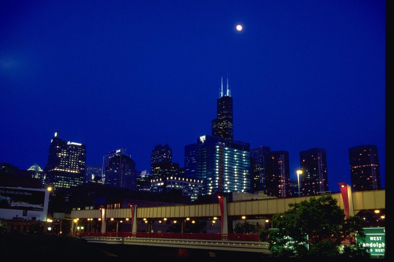 Chicago skyline at night with moon