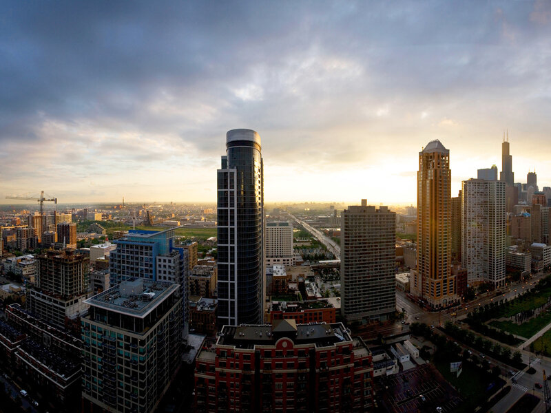 Chicago Skyline at Sunset — Gray, Dramatic, Photograph, Skyscrapers, Clouds, Highway, Construction Crane