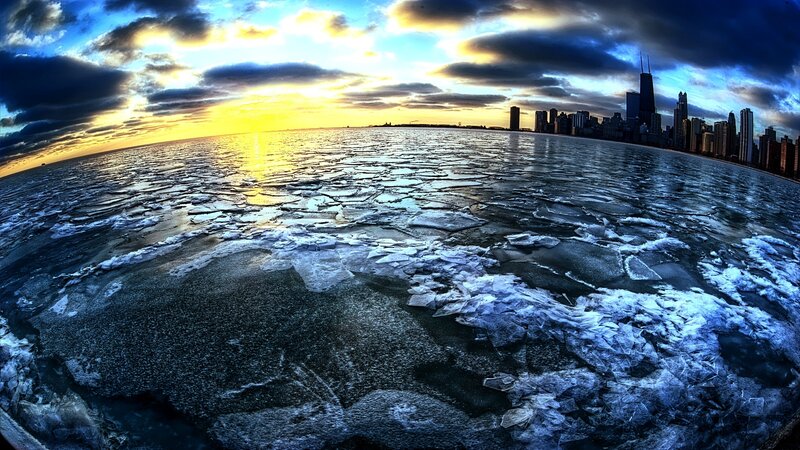 Chicago skyline at sunset on frozen lake