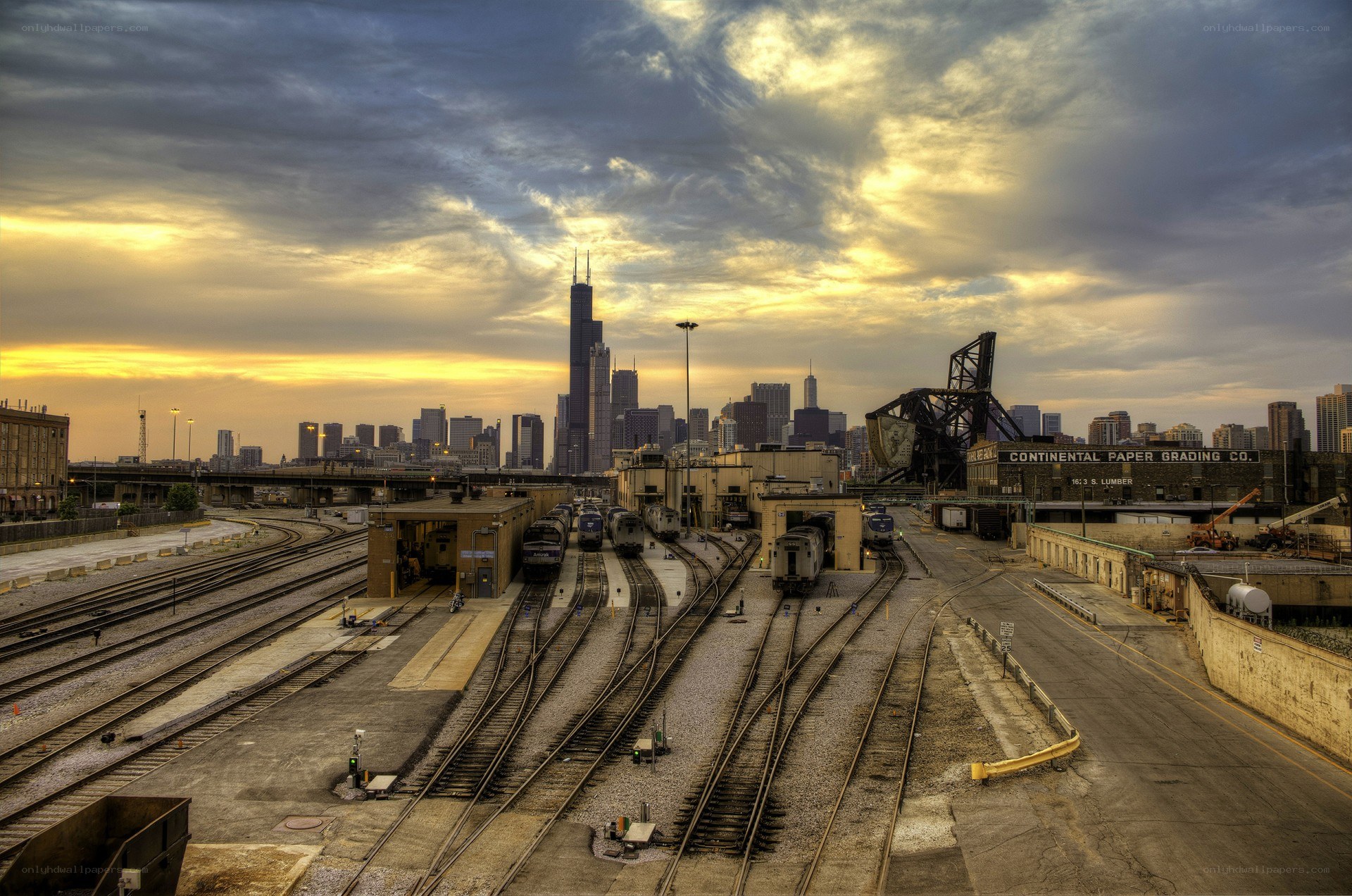 Chicago skyline at sunset with train yard