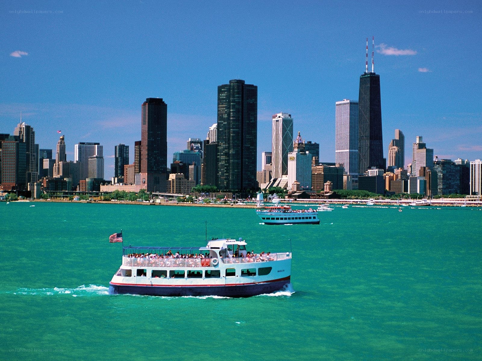 Chicago skyline with tour boats