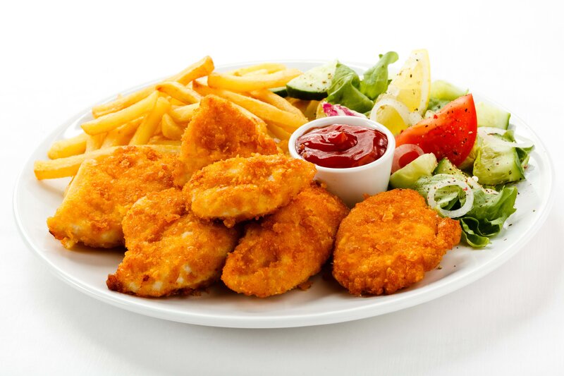 chicken nuggets with fries and salad