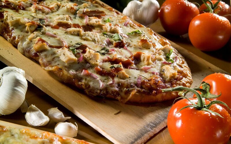 Chicken pizza on wooden board