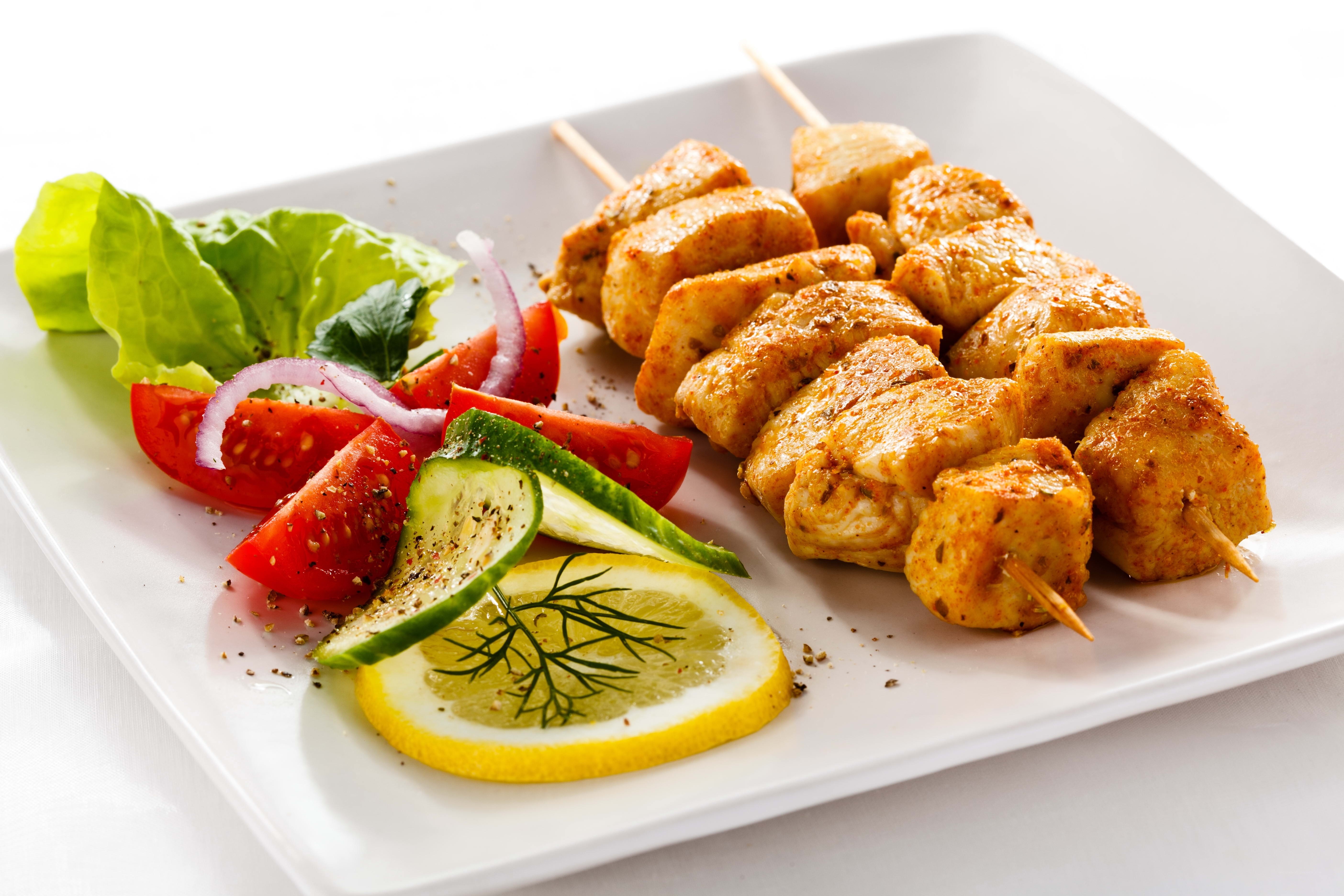 chicken skewers with salad