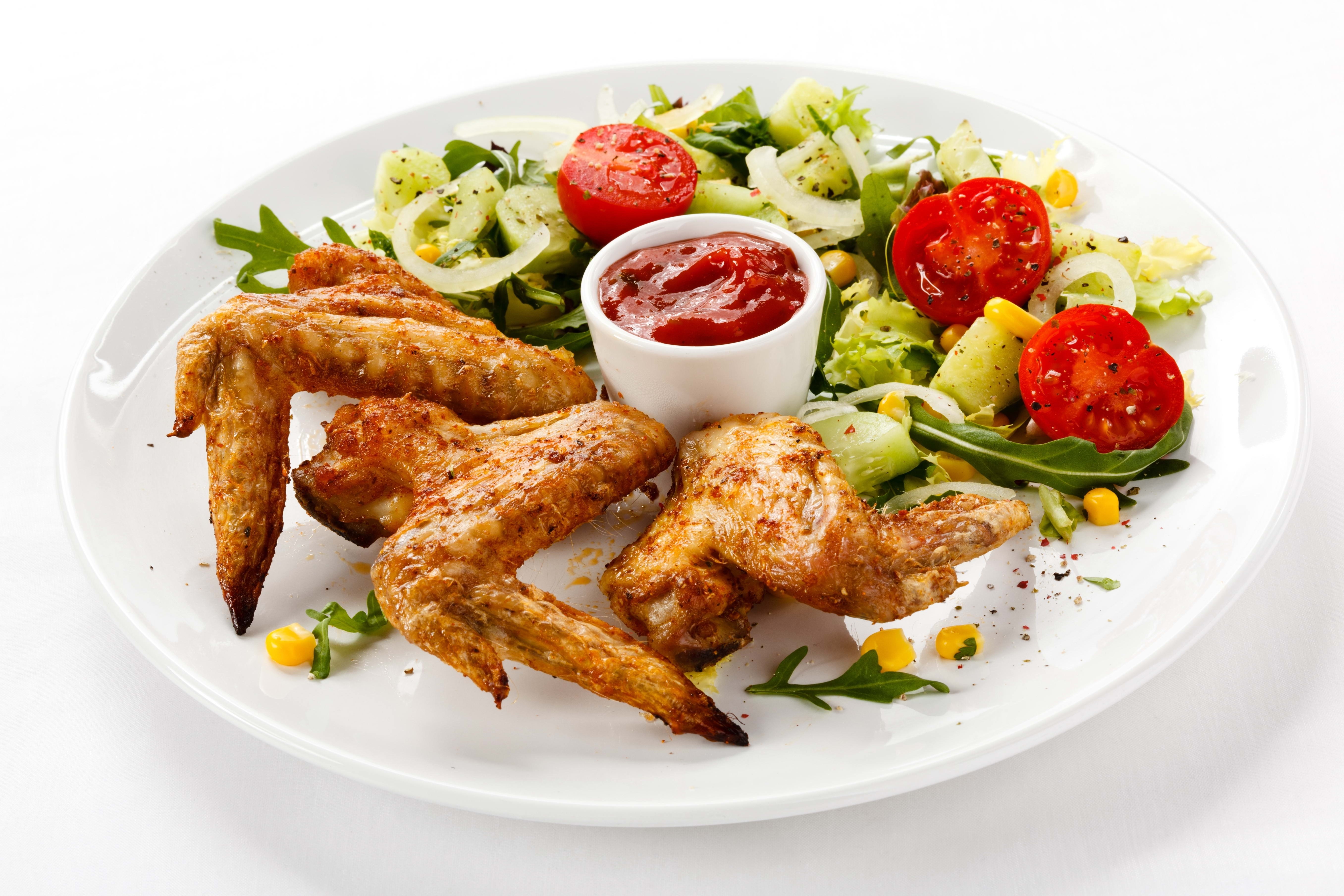 chicken wings with salad