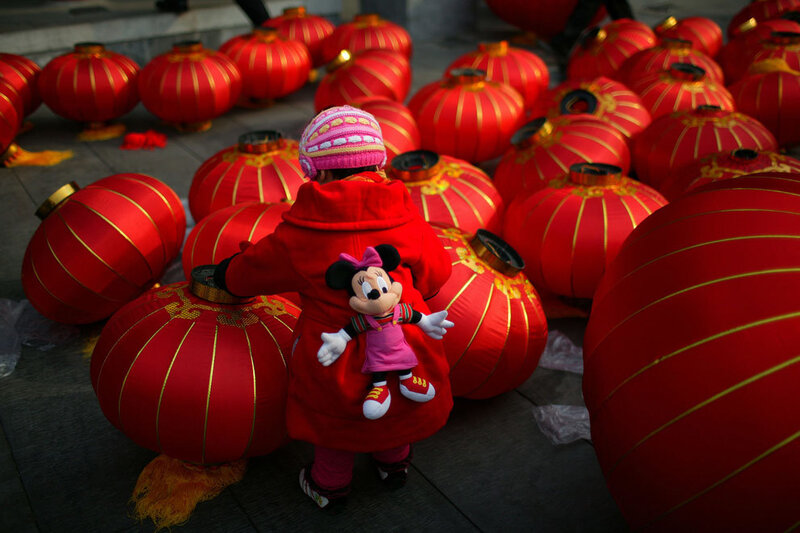 Child among red lanterns