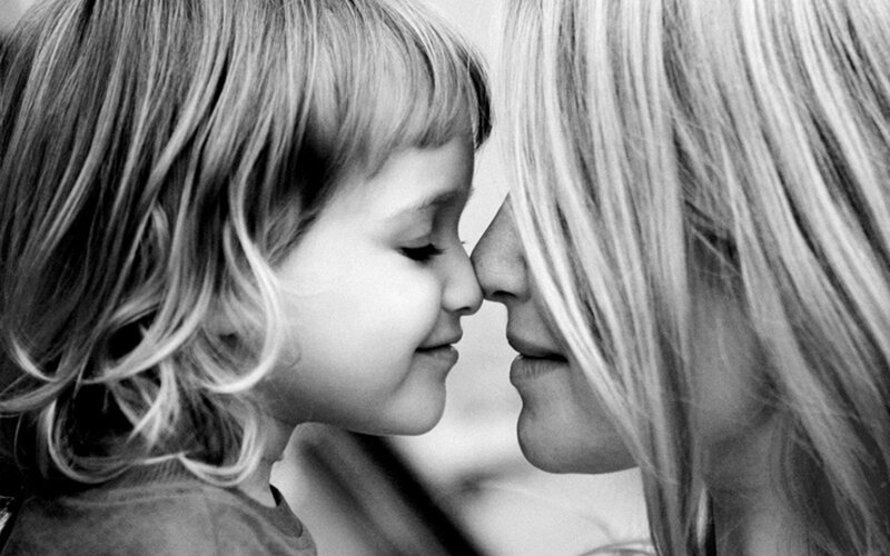 Child and Adult Touching Noses