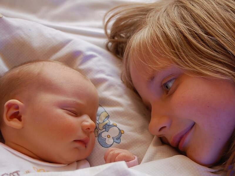 Child and Baby Lying