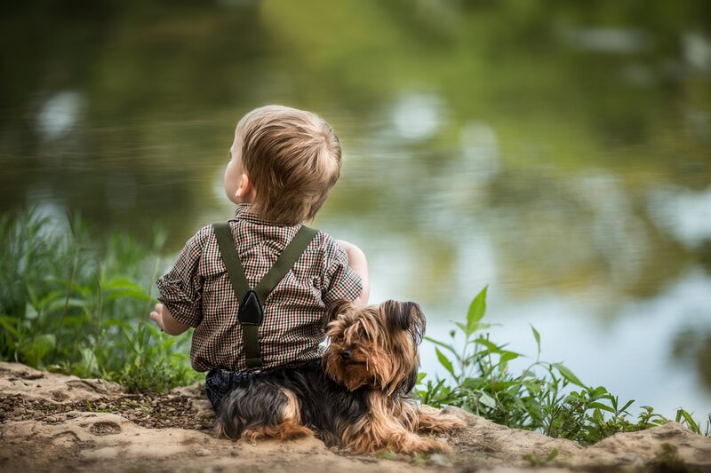 Child and Dog by Water