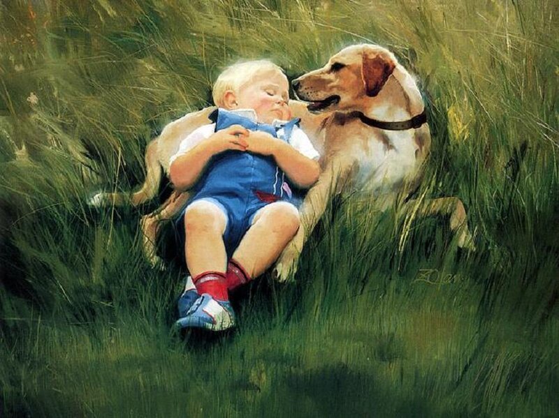 Child and dog in grass