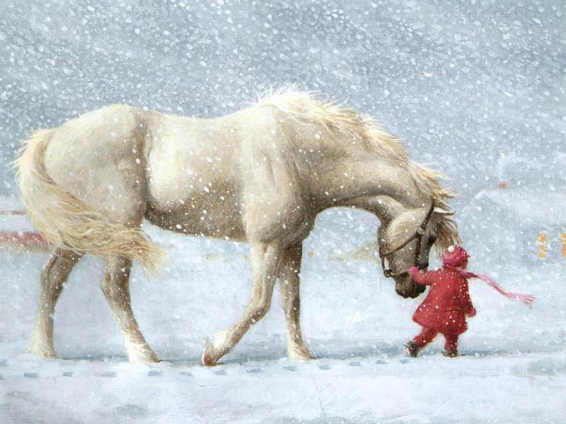 child and horse in snow