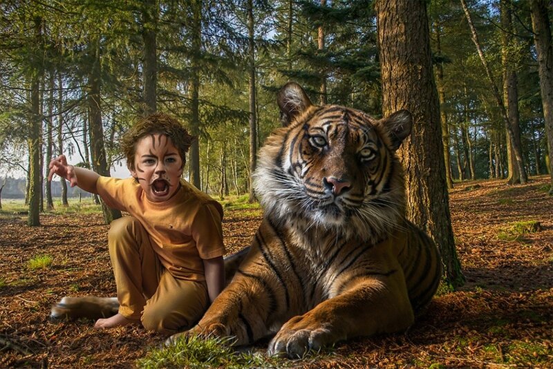 child and tiger in forest