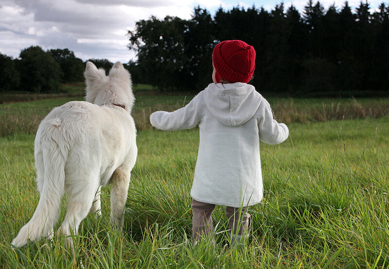 Child and White Dog