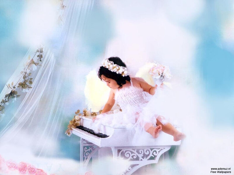 child angel playing piano