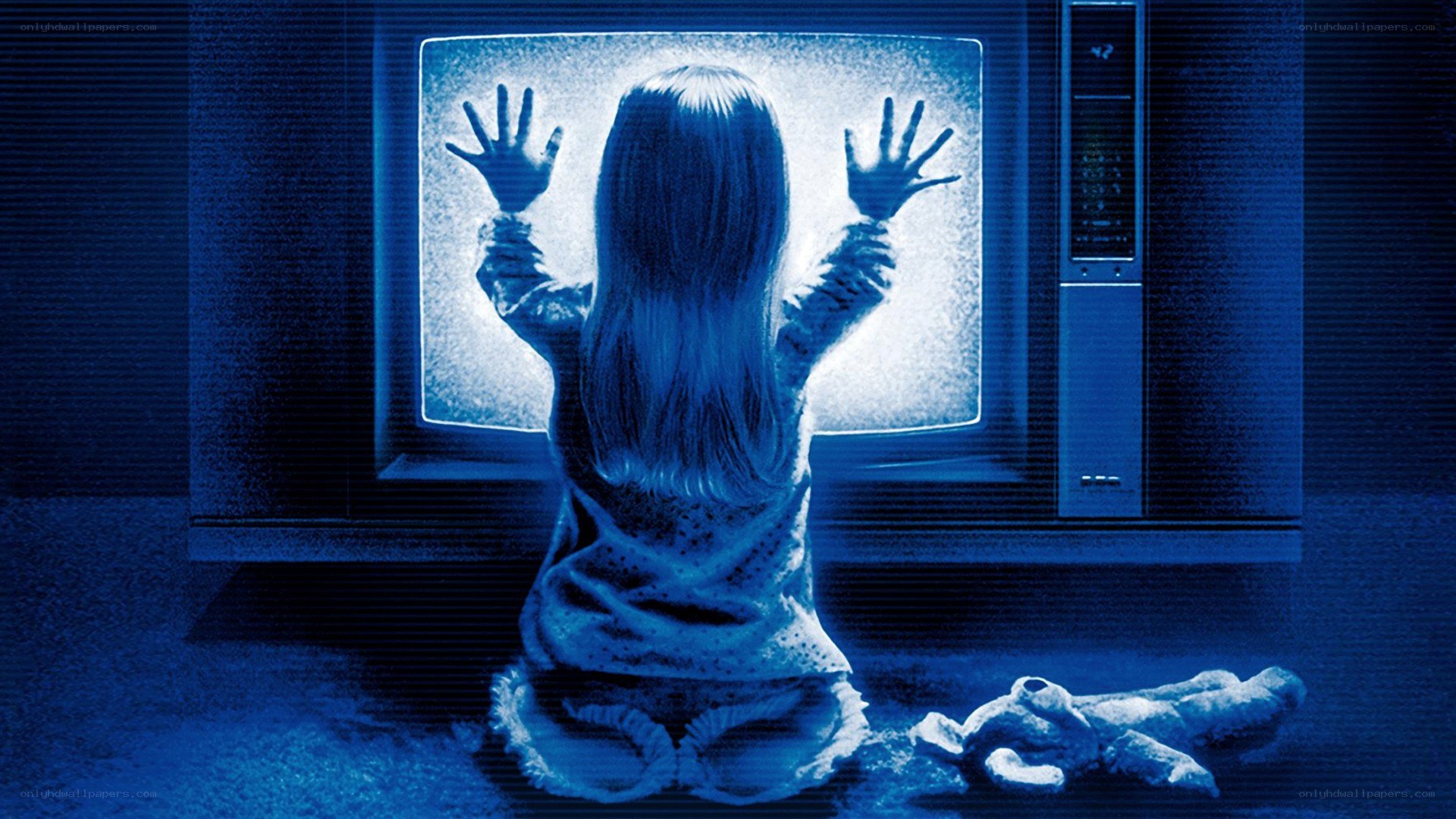 child at glowing television