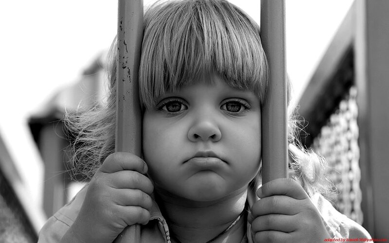 child behind bars