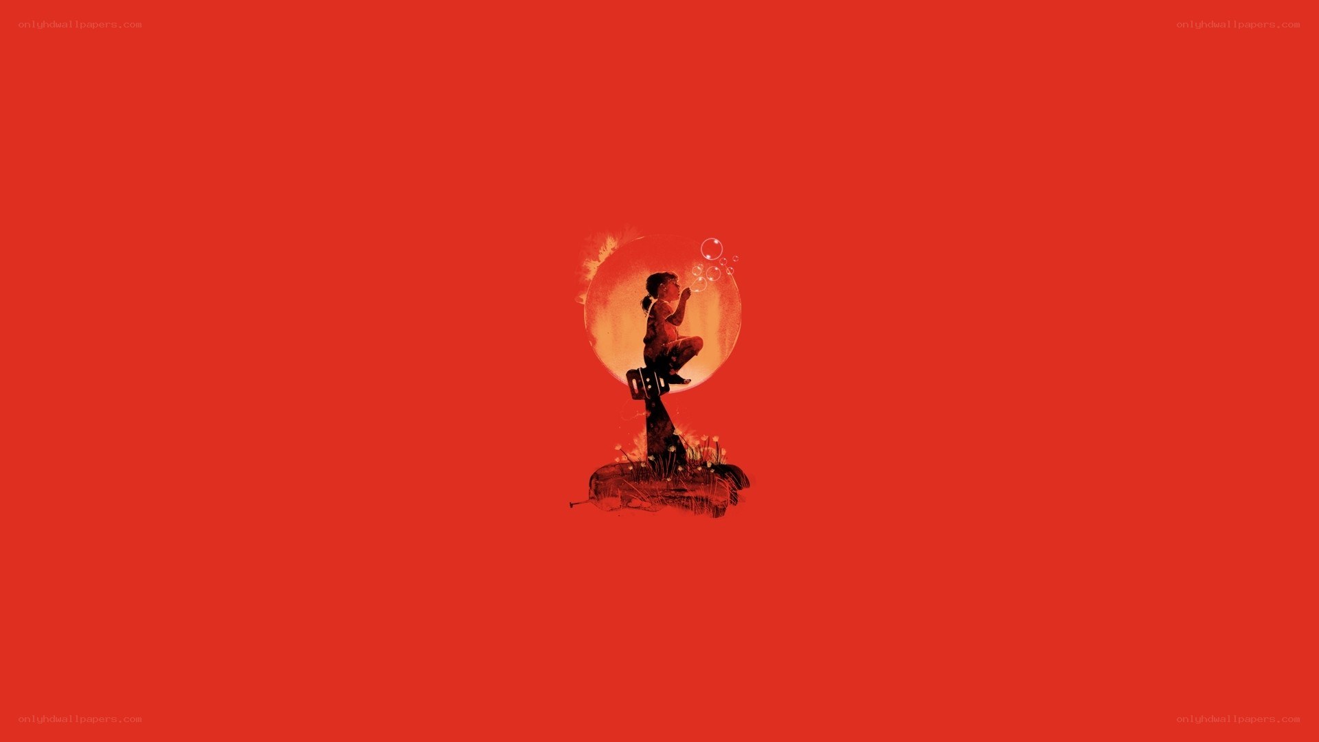 child blowing bubbles on red background
