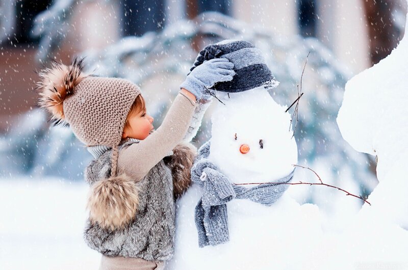 Child Building Snowman — White, Playful