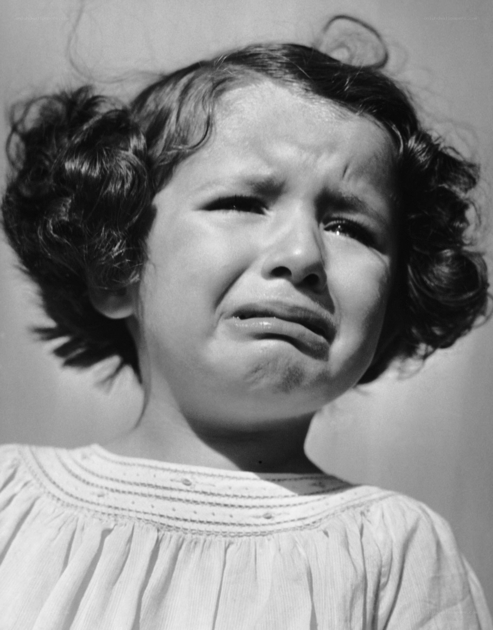 child crying in distress
