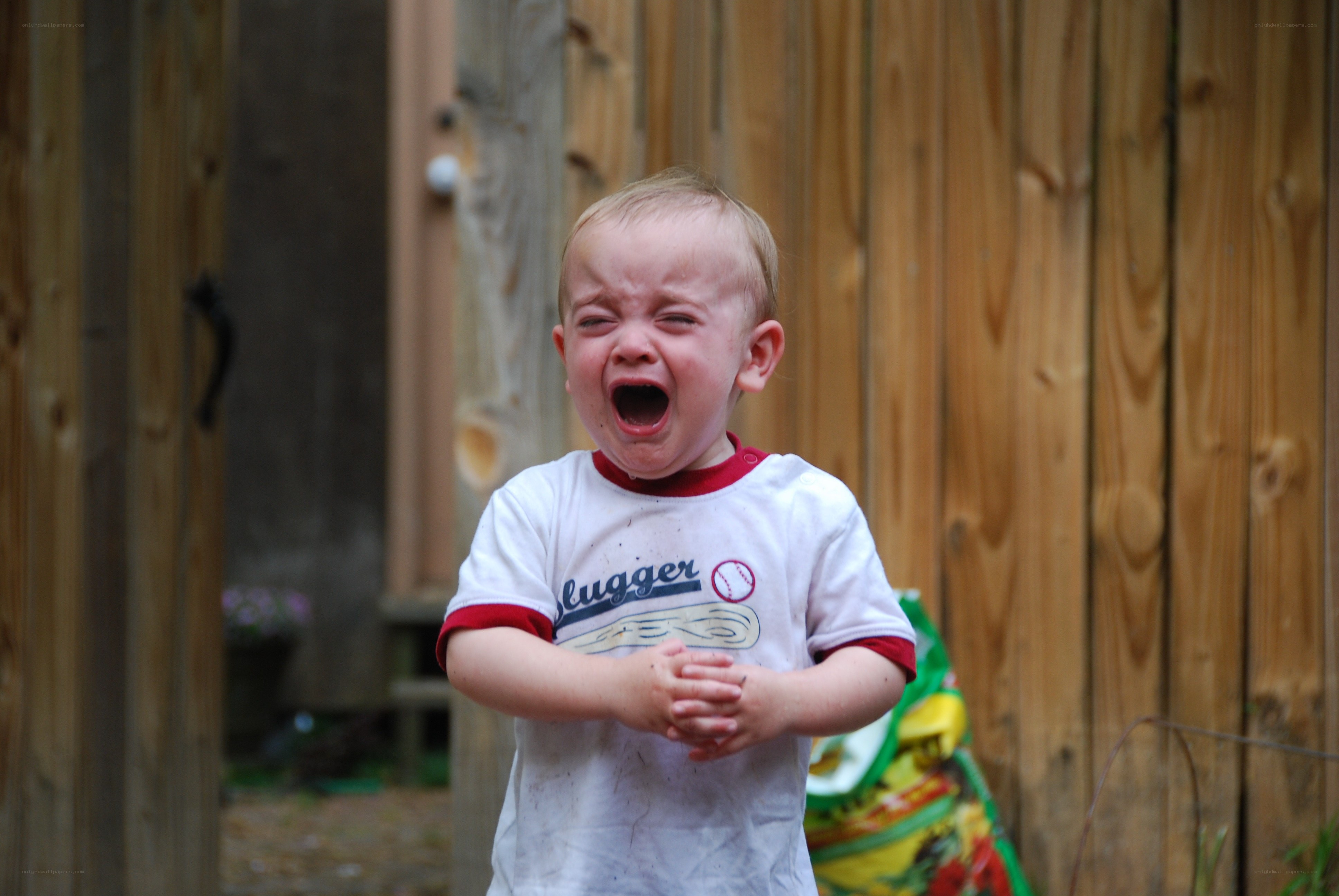 child crying outdoors