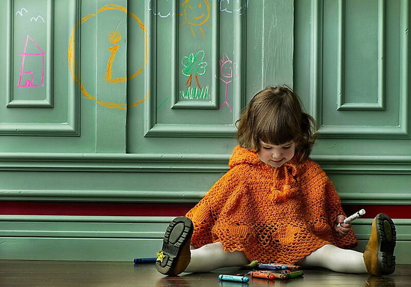 Child Drawing on Wall