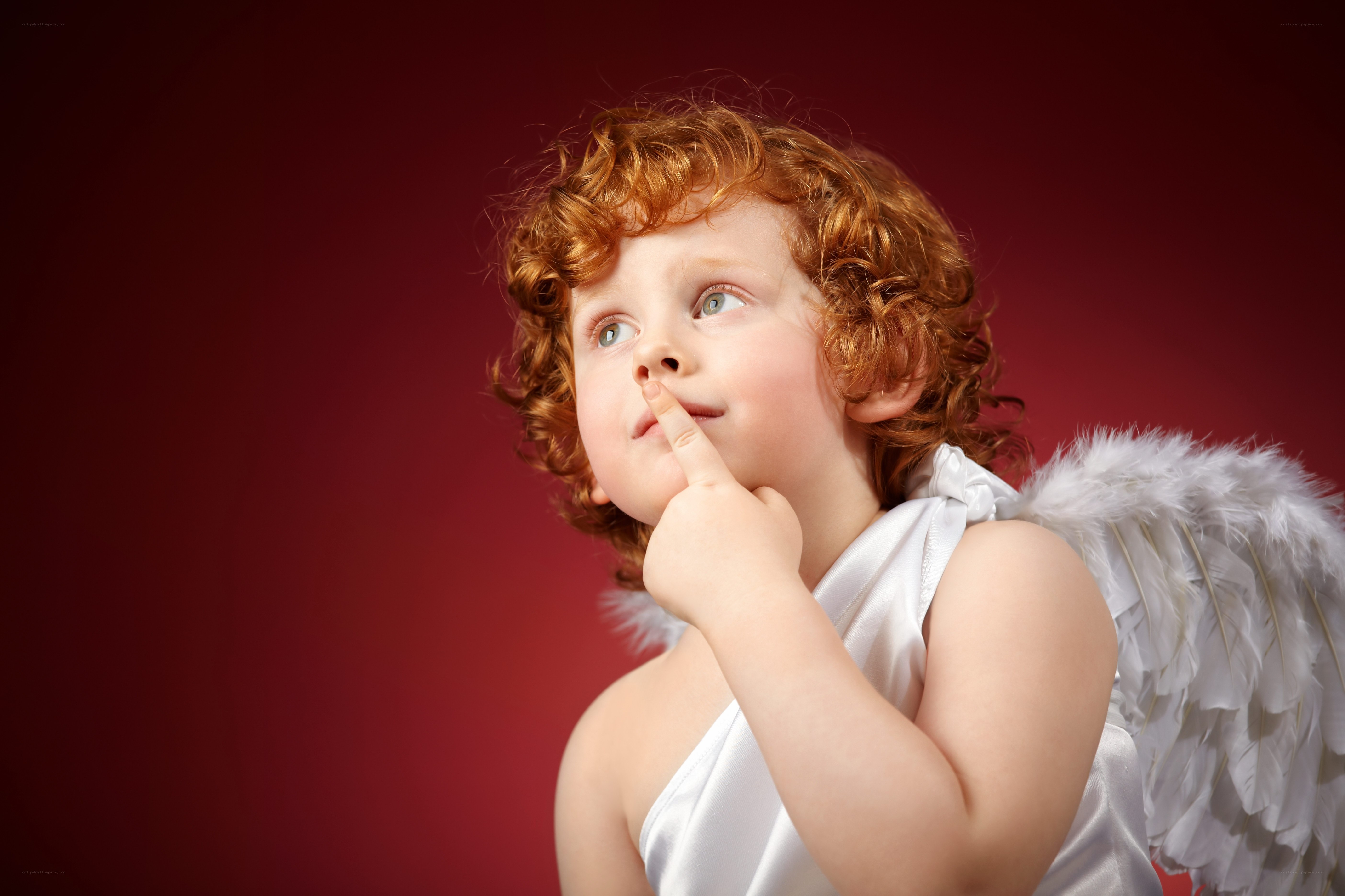 child dressed as angel
