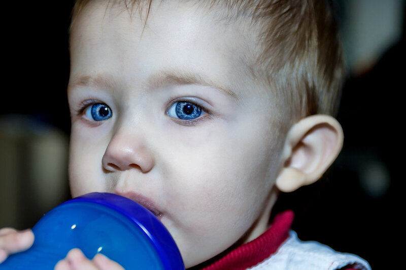 Child Drinking from Sippy Cup