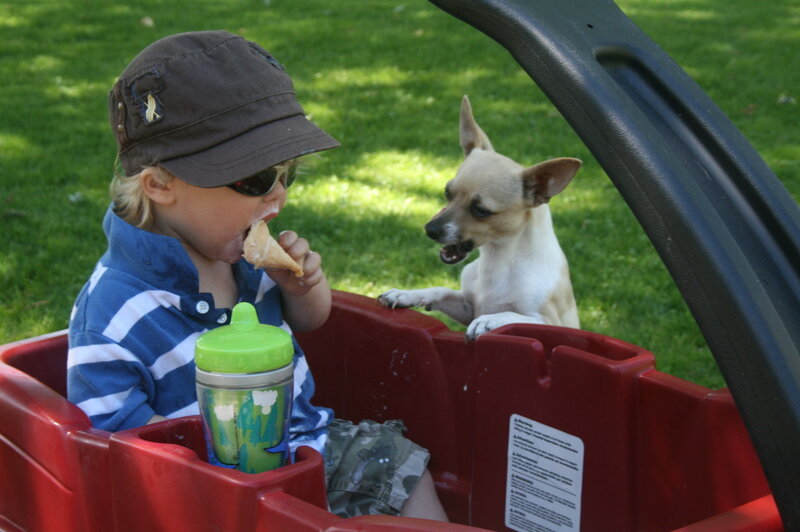 Child Eating Ice Cream — Red