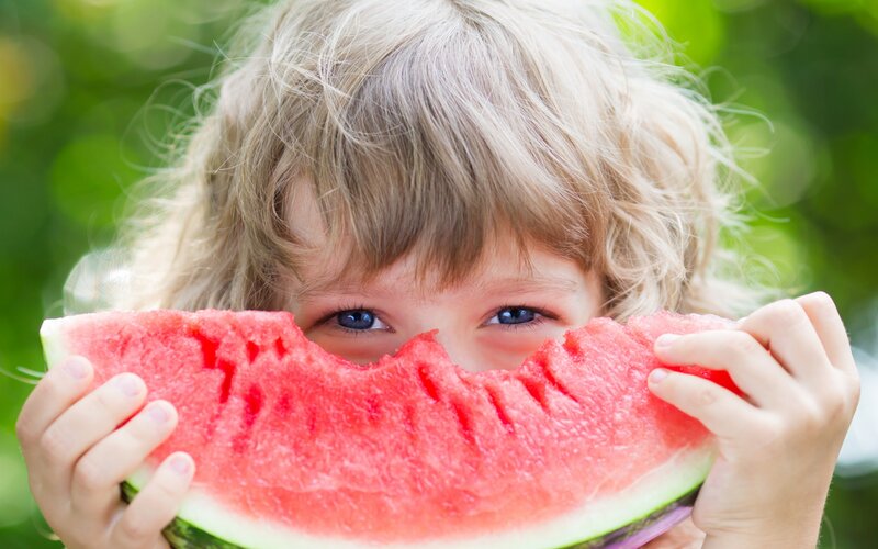 Child Eating Watermelon — Red