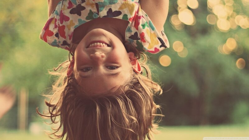 Child Hanging Upside Down — Green