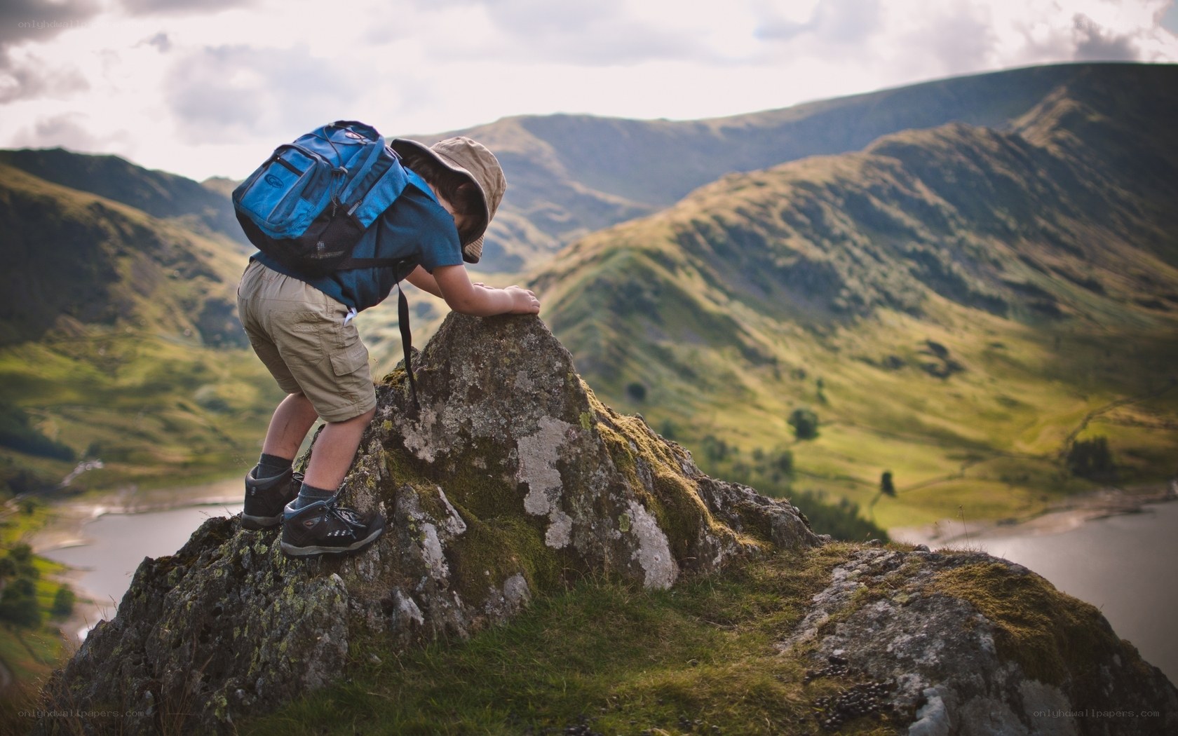 Child hiking on a mountain